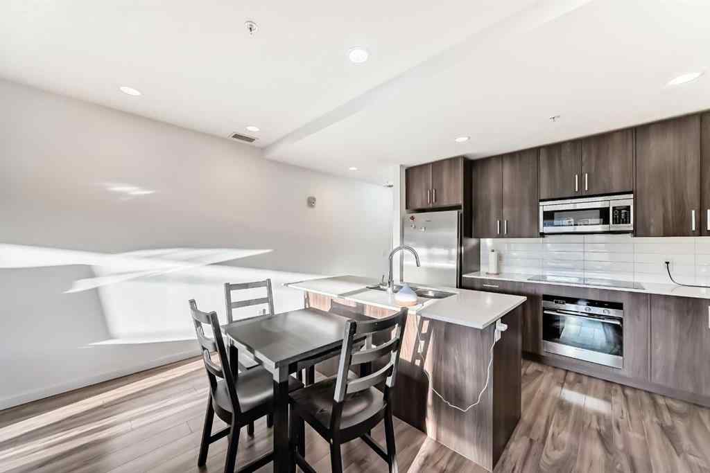MLS® A2257403 - Unit #102 1629 38 Street SW in Rosscarrock Calgary, Residential