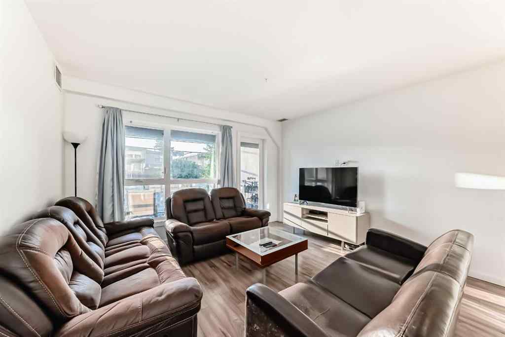 MLS® A2257403 - Unit #102 1629 38 Street SW in Rosscarrock Calgary, Residential