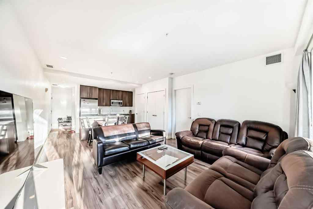 MLS® A2257403 - Unit #102 1629 38 Street SW in Rosscarrock Calgary, Residential