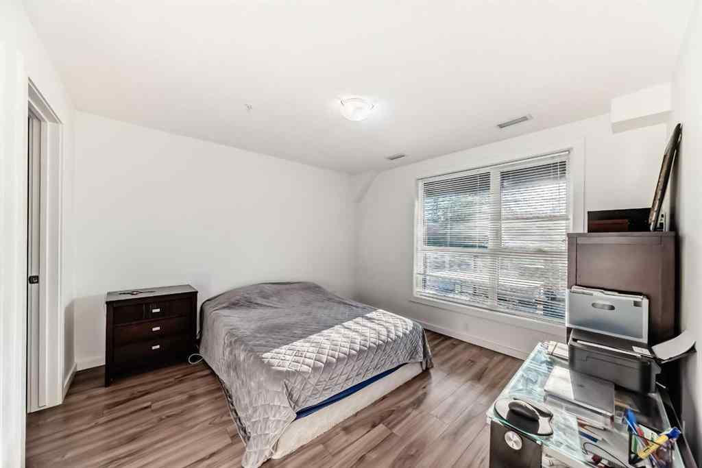 MLS® A2257403 - Unit #102 1629 38 Street SW in Rosscarrock Calgary, Residential
