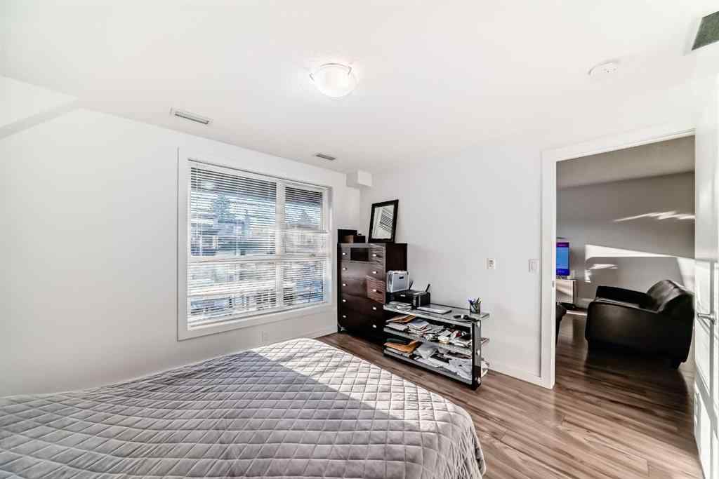 MLS® A2257403 - Unit #102 1629 38 Street SW in Rosscarrock Calgary, Residential
