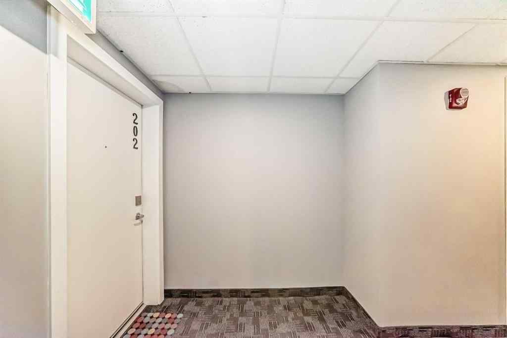 MLS® A2257405 - Unit #202 1629 38 Street SW in Rosscarrock Calgary, Residential