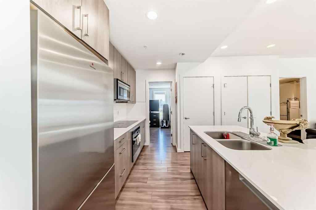 MLS® A2257405 - Unit #202 1629 38 Street SW in Rosscarrock Calgary, Residential