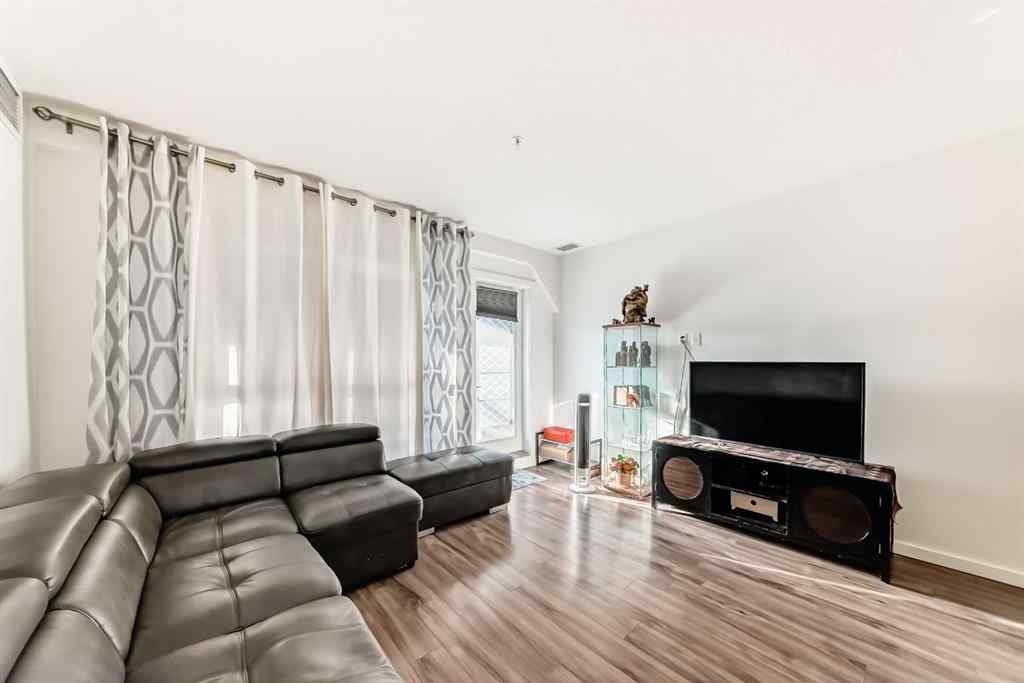 MLS® A2257405 - Unit #202 1629 38 Street SW in Rosscarrock Calgary, Residential