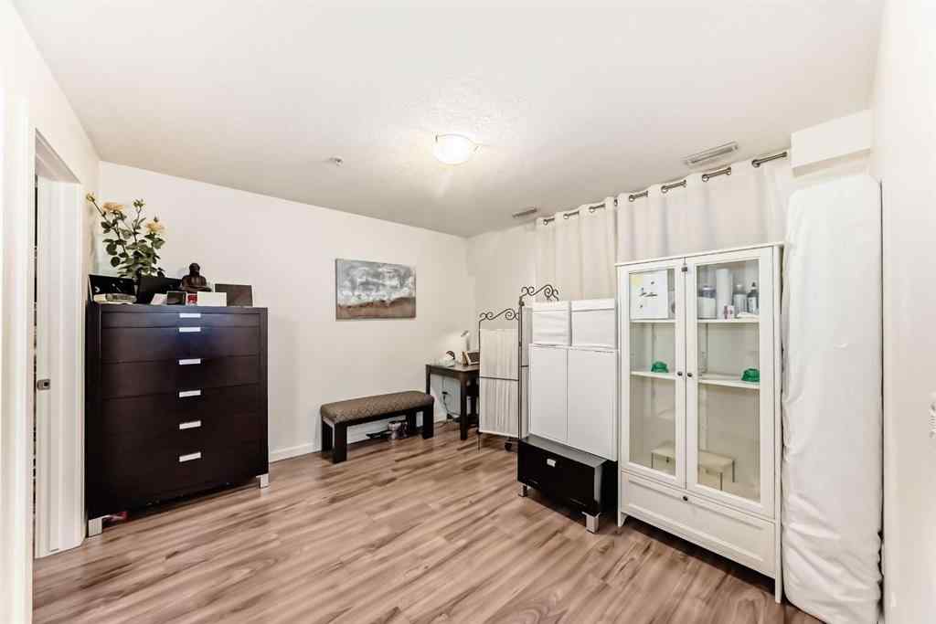 MLS® A2257405 - Unit #202 1629 38 Street SW in Rosscarrock Calgary, Residential