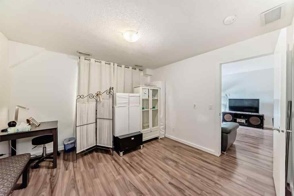 MLS® A2257405 - Unit #202 1629 38 Street SW in Rosscarrock Calgary, Residential