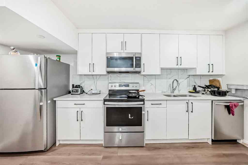 MLS® A2257406 - 630 148 Avenue NW in Livingston Calgary, Residential