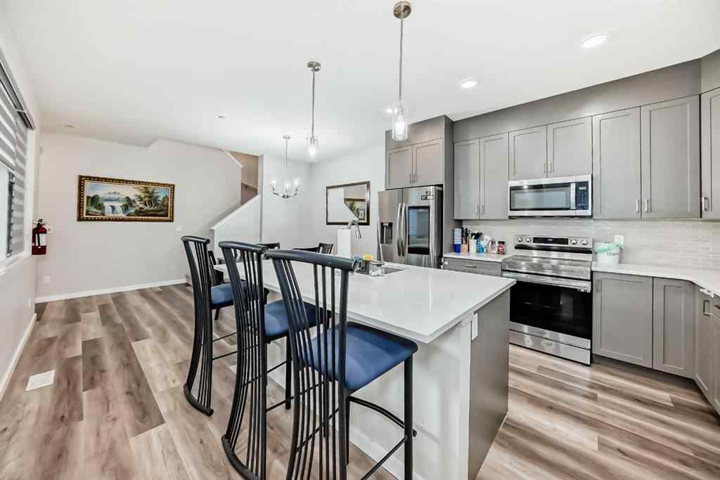 MLS® A2257406 - 630 148 Avenue NW in Livingston Calgary, Residential