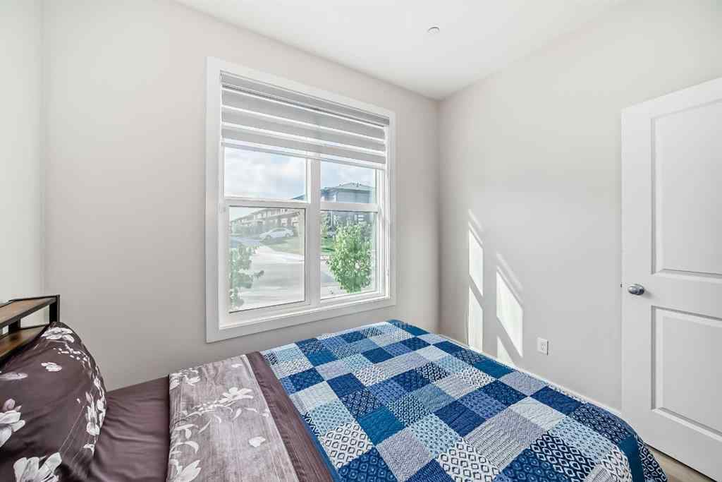 MLS® A2257406 - 630 148 Avenue NW in Livingston Calgary, Residential