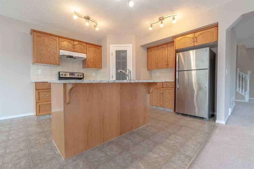 MLS® A2257417 - 91 Cougartown Close SW in Cougar Ridge Calgary, Residential