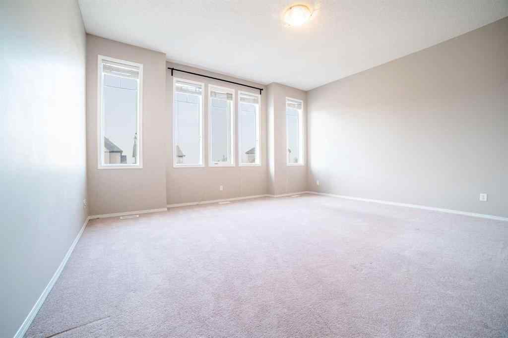 MLS® A2257417 - 91 Cougartown Close SW in Cougar Ridge Calgary, Residential