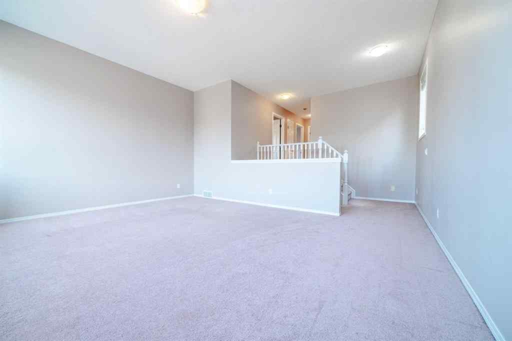 MLS® A2257417 - 91 Cougartown Close SW in Cougar Ridge Calgary, Residential
