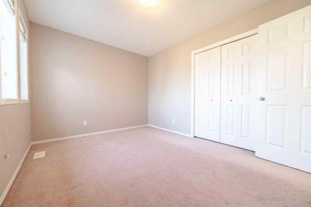 MLS® A2257417 - 91 Cougartown Close SW in Cougar Ridge Calgary, Residential