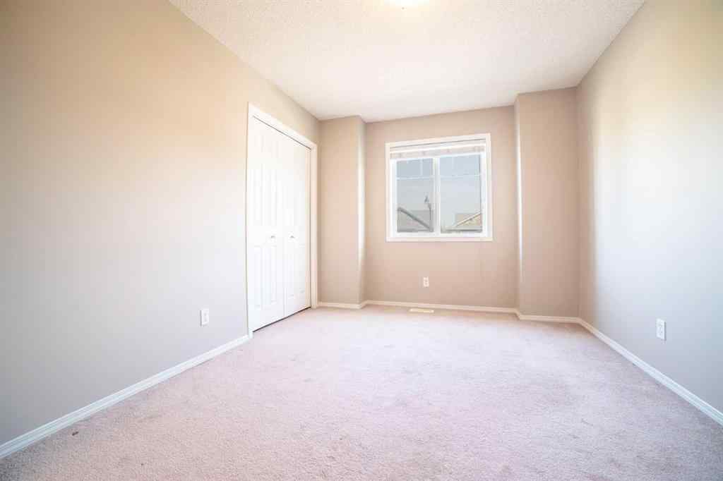 MLS® A2257417 - 91 Cougartown Close SW in Cougar Ridge Calgary, Residential