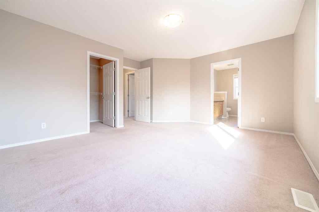 MLS® A2257417 - 91 Cougartown Close SW in Cougar Ridge Calgary, Residential