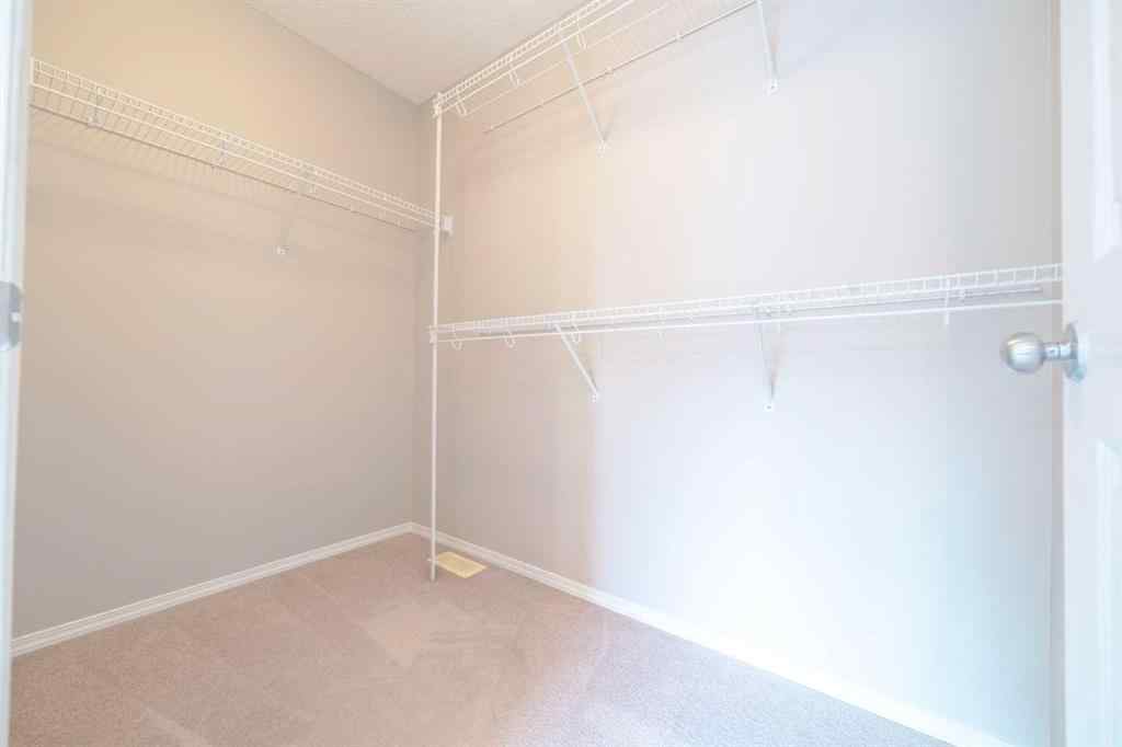 MLS® A2257417 - 91 Cougartown Close SW in Cougar Ridge Calgary, Residential
