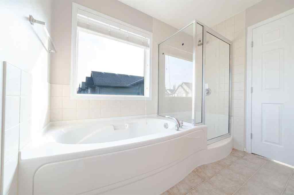 MLS® A2257417 - 91 Cougartown Close SW in Cougar Ridge Calgary, Residential