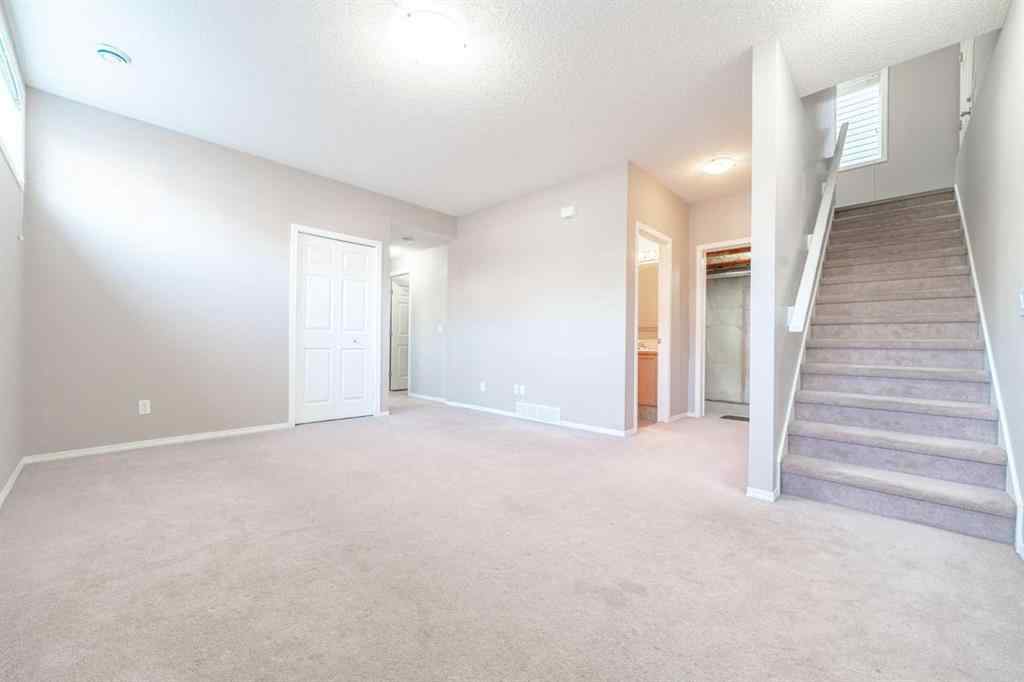 MLS® A2257417 - 91 Cougartown Close SW in Cougar Ridge Calgary, Residential