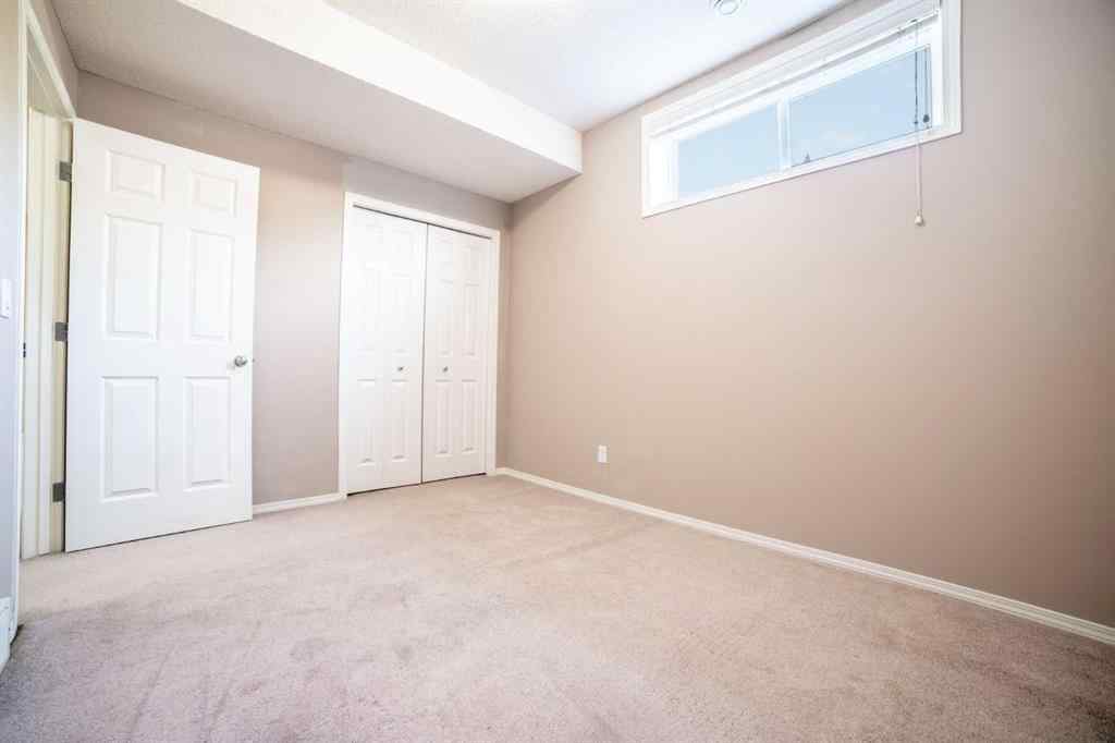 MLS® A2257417 - 91 Cougartown Close SW in Cougar Ridge Calgary, Residential
