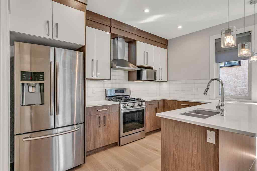 MLS® A2257426 - Unit #1 1936 26 Street SW in Killarney/Glengarry Calgary, Residential