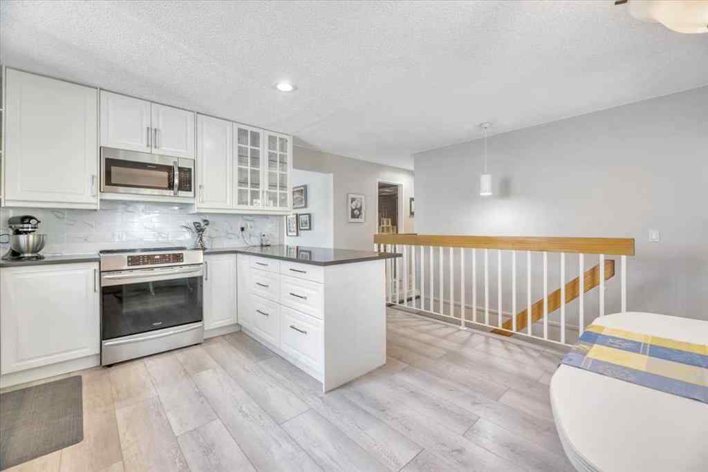 MLS® A2257430 - 488 Strathcona Drive SW in Strathcona Park Calgary, Residential
