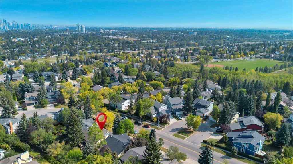 MLS® A2257430 - 488 Strathcona Drive SW in Strathcona Park Calgary, Residential