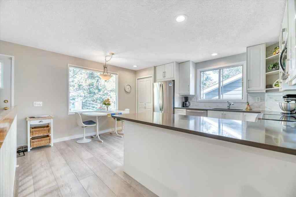 MLS® A2257430 - 488 Strathcona Drive SW in Strathcona Park Calgary, Residential