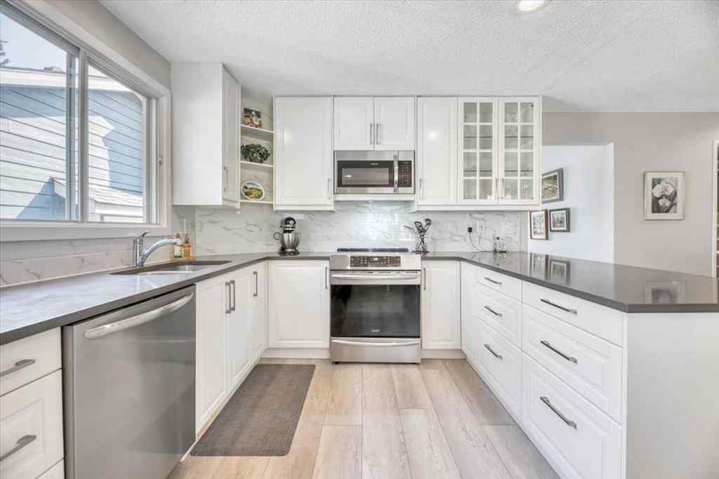 MLS® A2257430 - 488 Strathcona Drive SW in Strathcona Park Calgary, Residential
