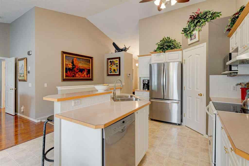 MLS® A2257433 - 83 Mt Douglas Villas SE in McKenzie Lake Calgary, Residential