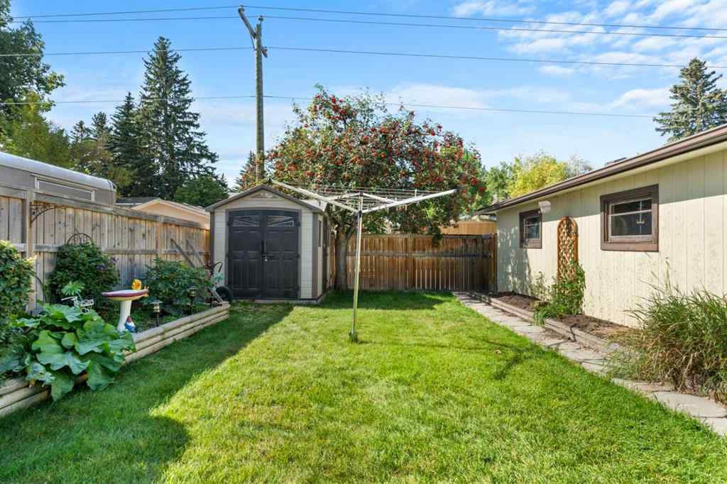 MLS® A2257439 - 12031 Candiac Road SW in Canyon Meadows Calgary, Residential