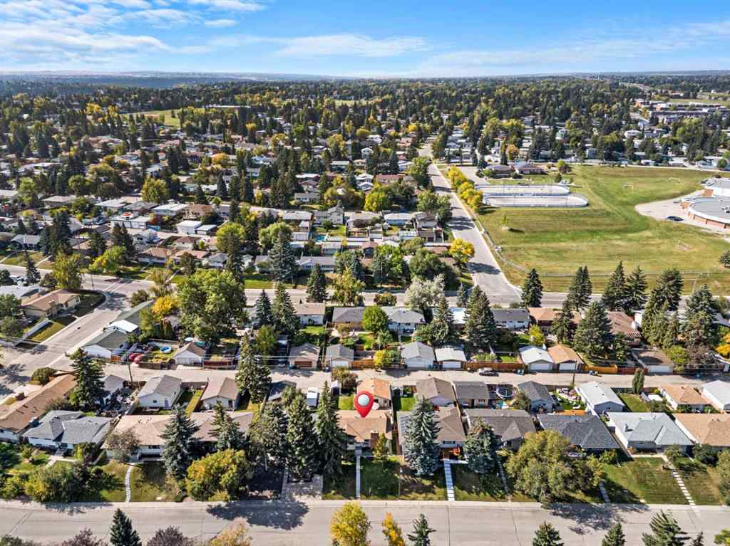 MLS® A2257439 - 12031 Candiac Road SW in Canyon Meadows Calgary, Residential