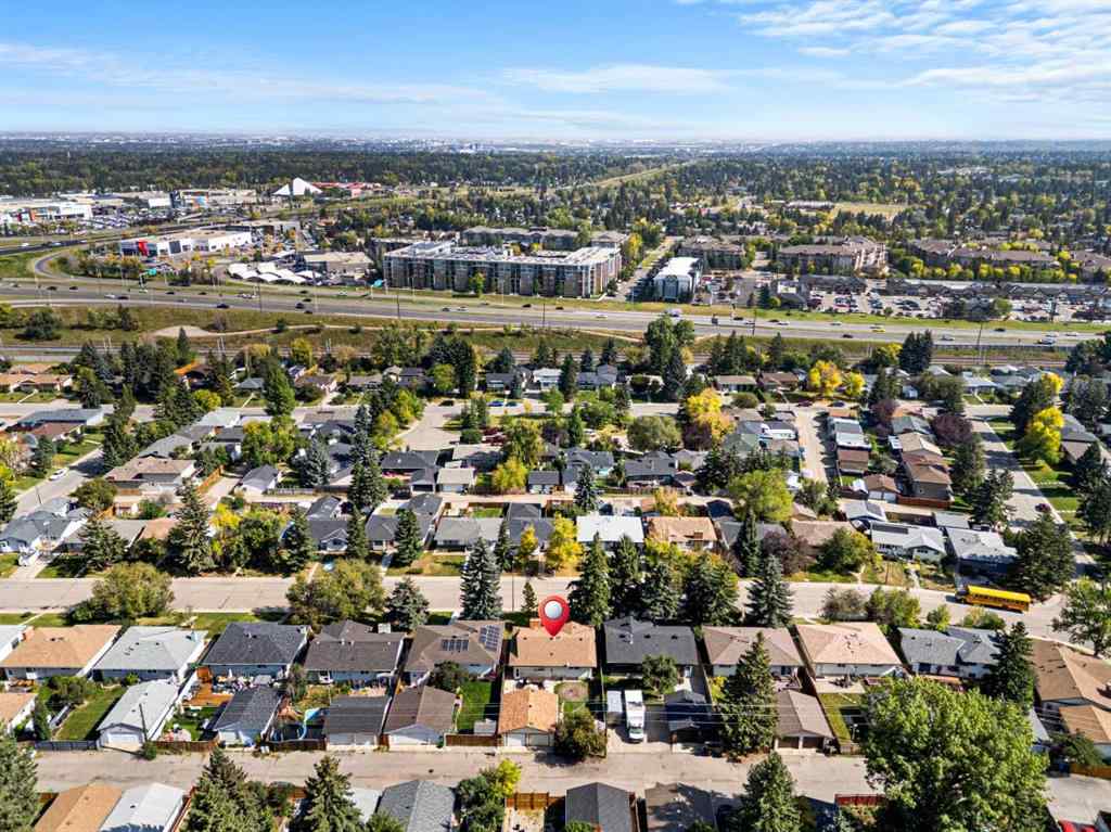 MLS® A2257439 - 12031 Candiac Road SW in Canyon Meadows Calgary, Residential