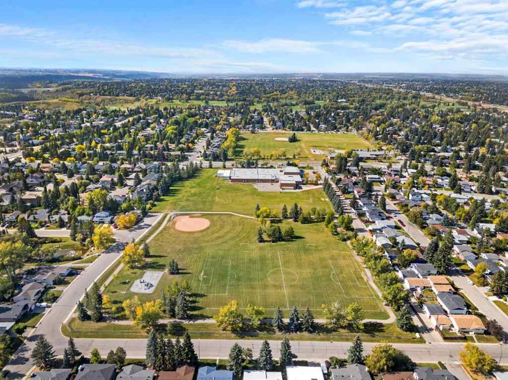 MLS® A2257439 - 12031 Candiac Road SW in Canyon Meadows Calgary, Residential