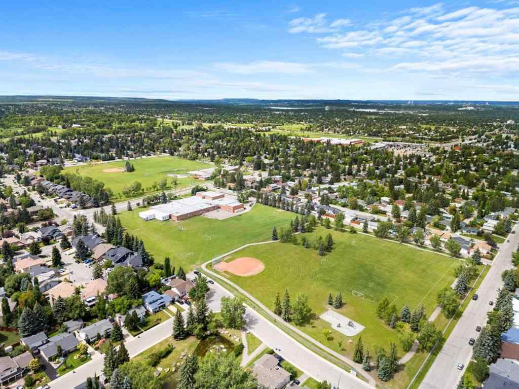 MLS® A2257439 - 12031 Candiac Road SW in Canyon Meadows Calgary, Residential