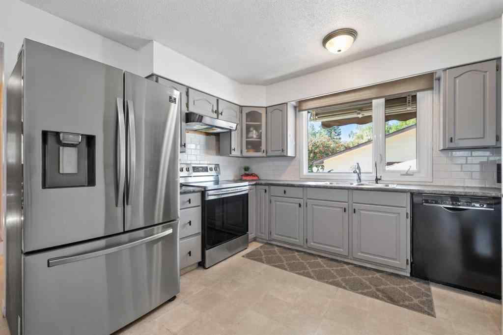 MLS® A2257439 - 12031 Candiac Road SW in Canyon Meadows Calgary, Residential