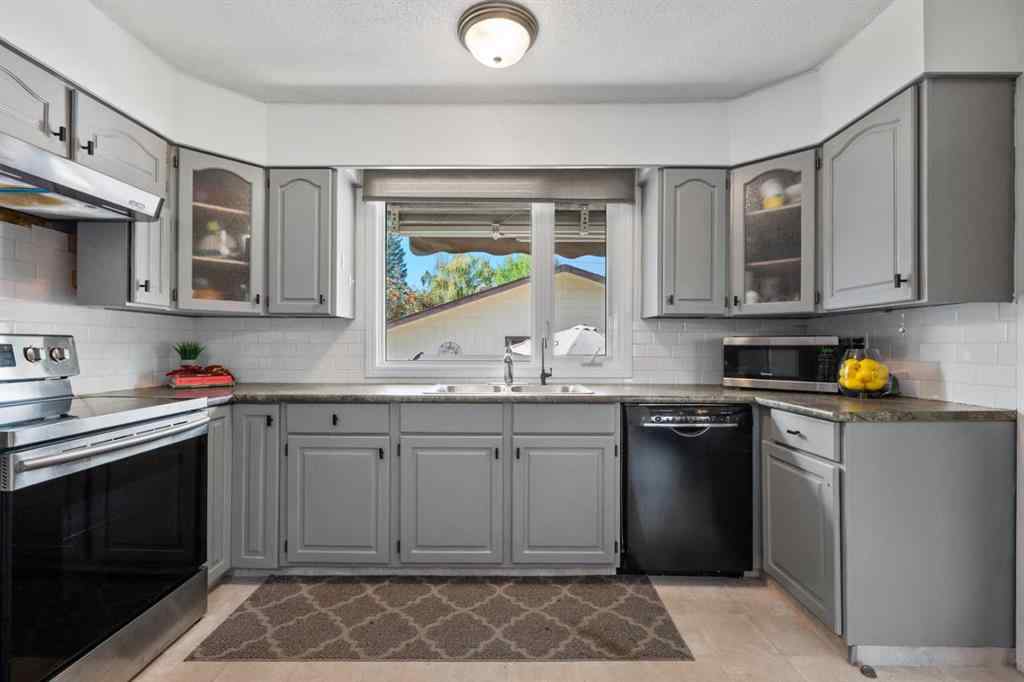 MLS® A2257439 - 12031 Candiac Road SW in Canyon Meadows Calgary, Residential