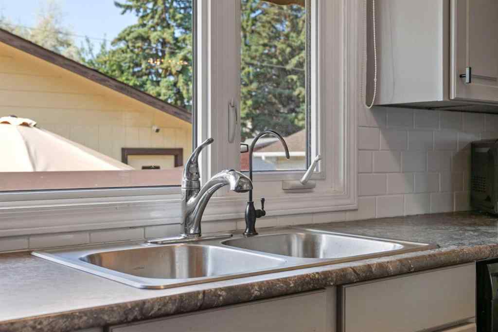 MLS® A2257439 - 12031 Candiac Road SW in Canyon Meadows Calgary, Residential
