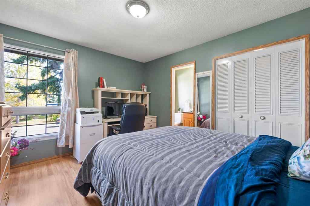 MLS® A2257439 - 12031 Candiac Road SW in Canyon Meadows Calgary, Residential
