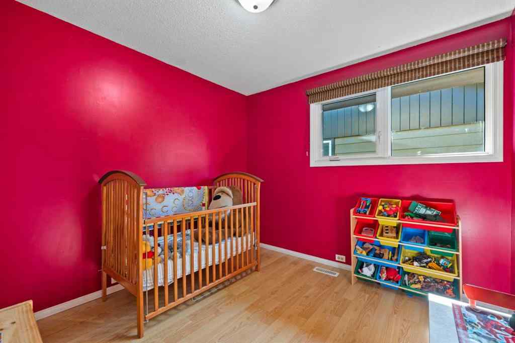 MLS® A2257439 - 12031 Candiac Road SW in Canyon Meadows Calgary, Residential