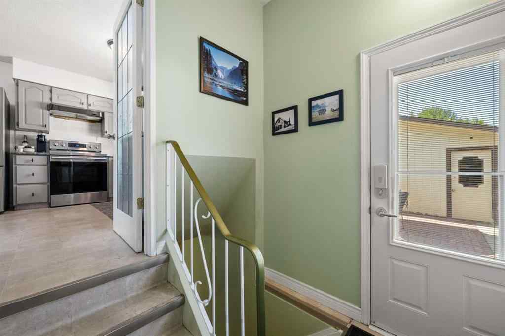 MLS® A2257439 - 12031 Candiac Road SW in Canyon Meadows Calgary, Residential
