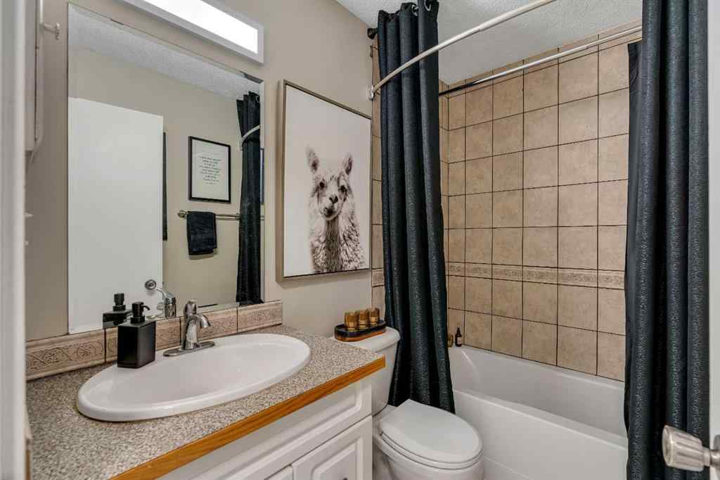 MLS® A2257483 - 415 Midridge Drive SE in Midnapore Calgary, Residential