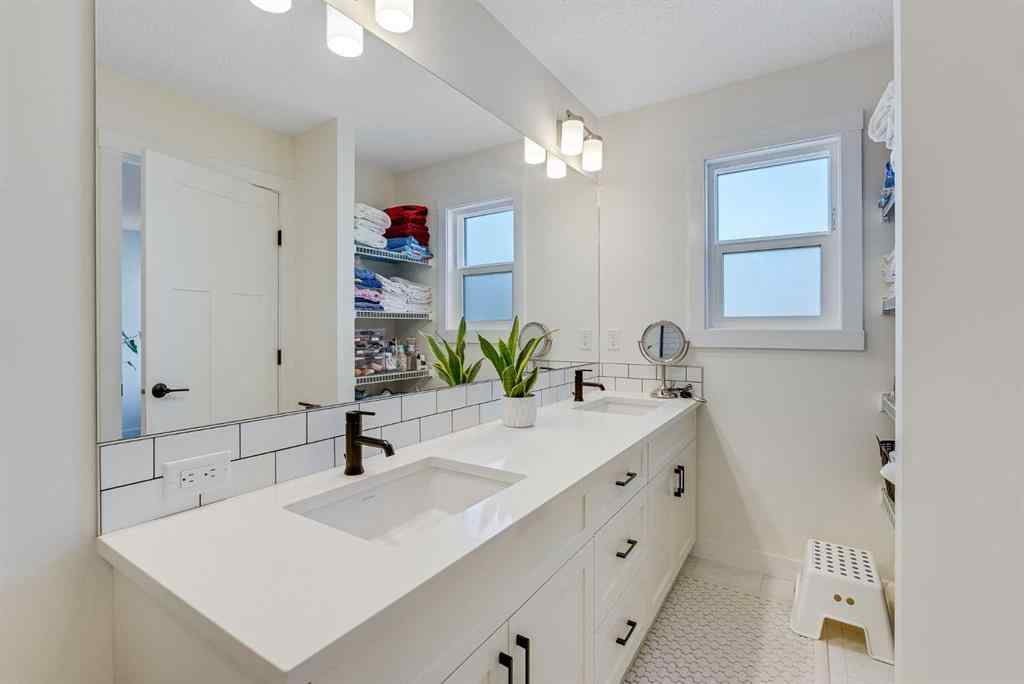 MLS® A2257503 - 145 Lucas Crescent NW in Livingston Calgary, Residential