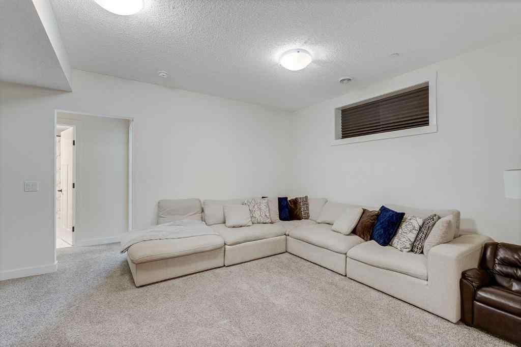 MLS® A2257503 - 145 Lucas Crescent NW in Livingston Calgary, Residential