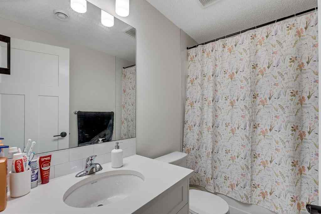 MLS® A2257503 - 145 Lucas Crescent NW in Livingston Calgary, Residential