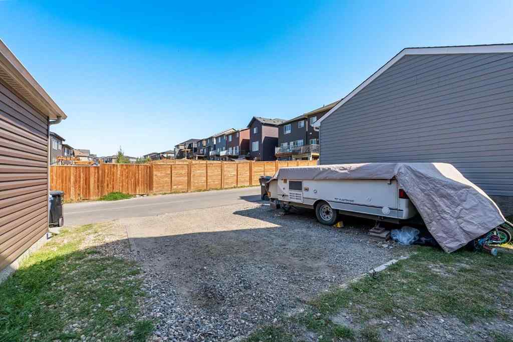 MLS® A2257503 - 145 Lucas Crescent NW in Livingston Calgary, Residential