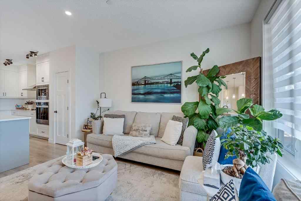 MLS® A2257503 - 145 Lucas Crescent NW in Livingston Calgary, Residential