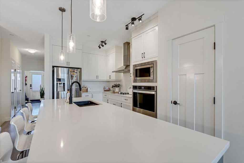 MLS® A2257503 - 145 Lucas Crescent NW in Livingston Calgary, Residential