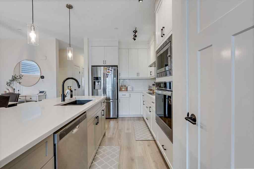 MLS® A2257503 - 145 Lucas Crescent NW in Livingston Calgary, Residential