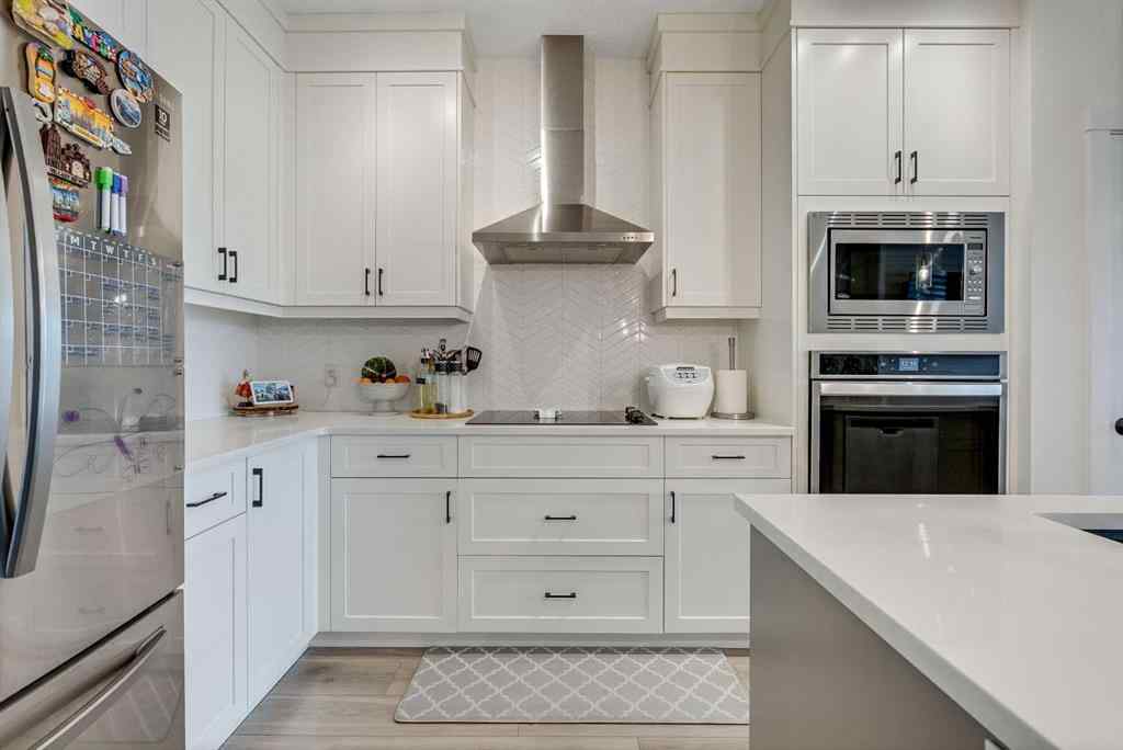 MLS® A2257503 - 145 Lucas Crescent NW in Livingston Calgary, Residential