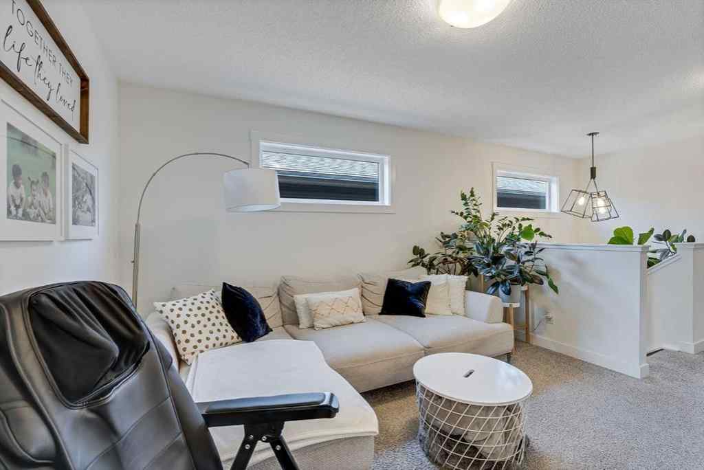 MLS® A2257503 - 145 Lucas Crescent NW in Livingston Calgary, Residential